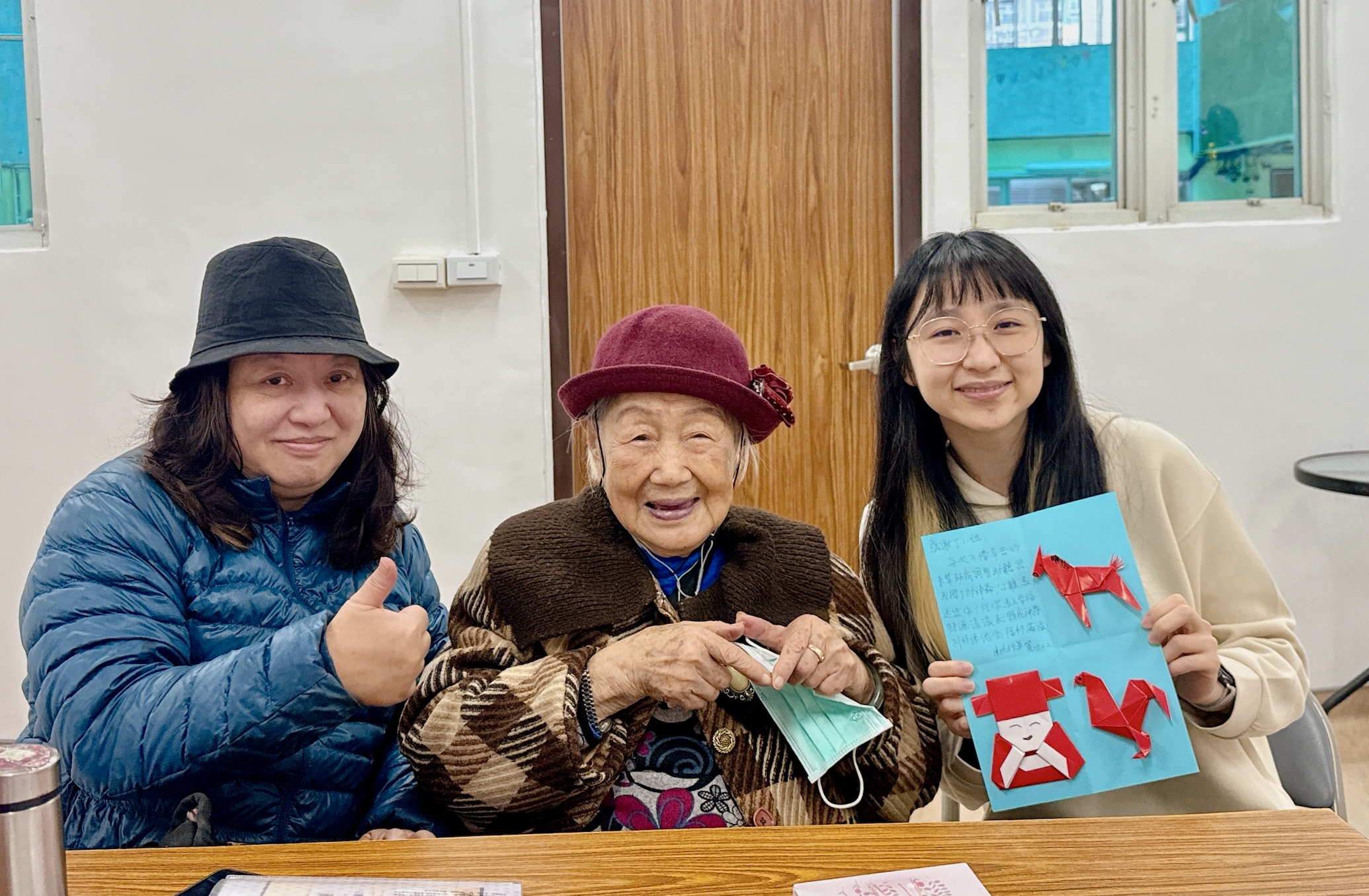 Mrs. Chen and Daughter Smiling Together